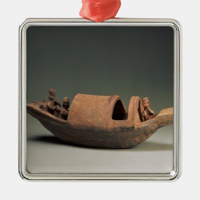 Boat and crew, tomb artefact metal tree decoration (Front)