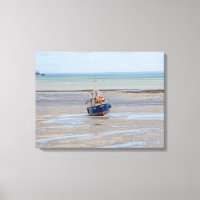Boat at low tide view canvas print