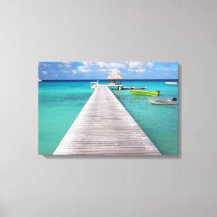 Boats at a jetty in the Pacific canvas print