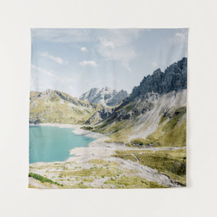 BODY OF WATER SURROUNDED BY MOUNTAINS TAPESTRY