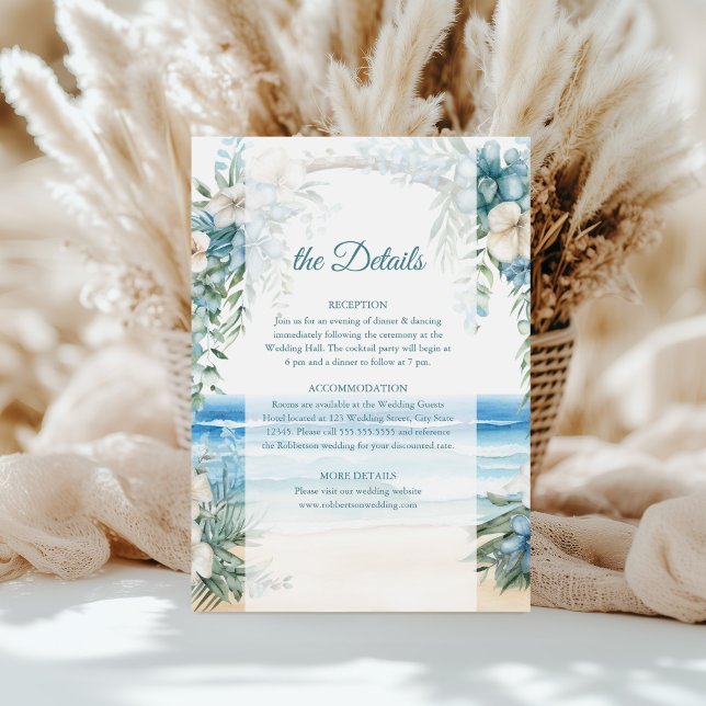 Boho Beach Blue Floral Arch Wedding Details Card (Boho Beach Blue Floral Arch Wedding Details Card on a table in front of white pampas grass.)