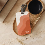 Boho Terracotta Monogram Initials Luggage Tag<br><div class="desc">This is a boho themed luggage tag featuring a modern font and hues of terracotta cream. All wording and colours are editable. // For matching items, please visit the "TRAVEL ACCESSORIES" collection in the By Nicole Designs Zazzle store. * If you like this design but don't see it available for...</div>