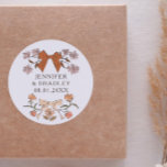 Boho Terracotta Ribbons Floral Wedding Favour  Classic Round Sticker<br><div class="desc">Boho and rustic wedding favour sticker featuring hand drawn illustration of bows and flowers in terracotta brown colours.</div>
