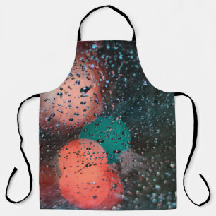 Bokeh photography of water droplets on clear glass apron
