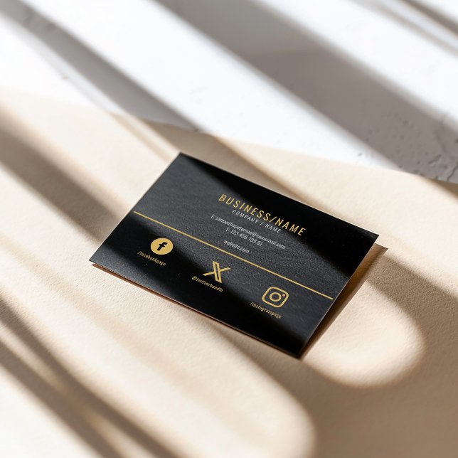 Bold black and gold, social media business card (Modern black business card with bold gold text and social media icons.)