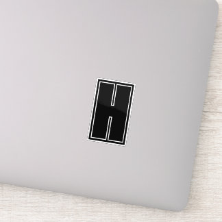 Bold black initial