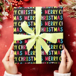 Bold Black Merry Christmas Multicolor Text Design Wrapping Paper<br><div class="desc">Make your holiday gifts stand out with this wrapping paper featuring a bold Merry Christmas design. The repeating Merry Christmas text in striking multicolored fonts such as pink, blue, green, yellow, and red on black background brings a festive contrast. Great for Christmas enthusiasts looking to wrap gifts with a dramatic...</div>