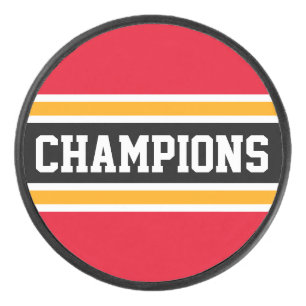 Bold CHAMPIONS Bright Red Black Orange Stripes Hockey Puck