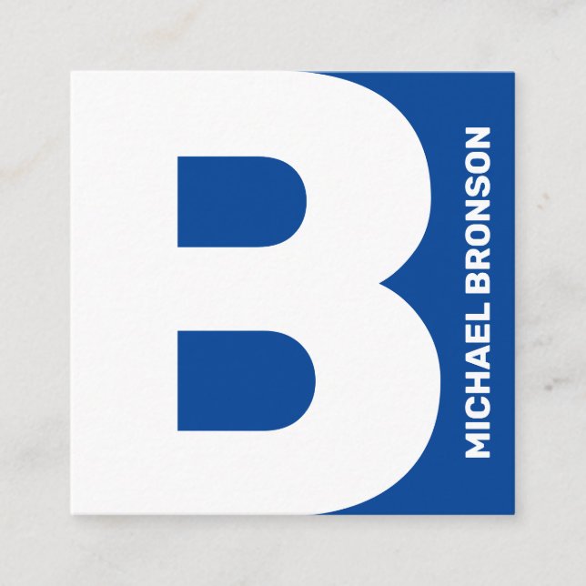 Bold giant letter cover blue white square business card (Front)