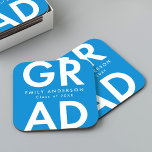 Bold Grad Blue Graduation Party Square Paper Coaster<br><div class="desc">Custom graduation paper coasters featuring "Grad" in bold white lettering with a blue background. Personalise the graduation coasters by adding the graduate's name and graduation year. The personalised graduation coasters are perfect for both high school and college graduation parties.</div>