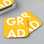 Bold Grad Yellow Graduation Party Square Paper Coaster<br><div class="desc">Custom graduation paper coasters featuring "Grad" in bold white lettering with a yellow background. Personalise the graduation coasters by adding the graduate's name and graduation year. The personalised graduation coasters are perfect for both high school and college graduation parties.</div>