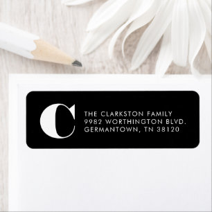 Bold initial black and white return address label