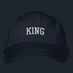 Bold KING Text Embroidered Adjustable Navy-Hat Hat<br><div class="desc">The Custom KING Text Printed Adjustable Cap is a stylish, go-to accessory for any casual look. Crafted from high-quality materials, this navy-coloured hat features bold, embroidered "KING" text, adding a touch of personality to your wardrobe. The adjustable strap ensures a perfect fit, making it comfortable for everyday wear while elevating...</div>