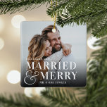 Bold Married & Merry Wedding Photo Newlywed Ceramic Ornament<br><div class="desc">Display a favorite wedding photo with this bold,  modern typography-based Christmas design,  featuring "married & merry" overlaid in white lettering joined by an oversized ampersand. Personalize with your wedding date and names. Design repeats on reverse side.</div>