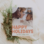 Bold Modern Full Vertical Photo Happy Holiday Card<br><div class="desc">Send warm wishes this holiday season with this unique and cute, bold modern full vertical photo happy holiday card. Its simple and minimalist design features boho-inspired elements in light pink, pastel coral, sage green, blush, and peach hues. Celebrating the festive spirit of December, this design brings a cheerful and fun...</div>