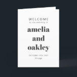 Bold Modern Minimalist Black White Wedding Programme<br><div class="desc">Welcome guests to your wedding day with this beautifully designed black and white folded program that combines simplicity and sophistication. The elegant cover features customisable names and event details in a bold typography, while the inside includes a preformatted template to outline your ceremony and wedding party details. The back is...</div>