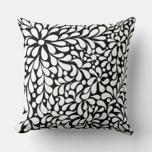 Bold modern white flowers on black background cushion