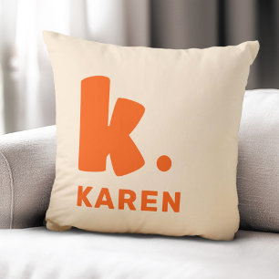 Bold monogram initial and name orange cushion