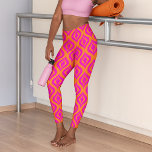 Bold Orange Hot Pink Summer Ikat Ogee Art Pattern Leggings<br><div class="desc">Get ready to turn heads with these elegant, stylish, and eclectic minimalism design leggings! Perfect for the artistic hip trendsetter, vintage retro art style, or abstract digital geometric motif lover. The beautiful contemporary vibrant hot pink and bright orange coloured Bohemian Ikat style ogee drops pattern will show off your unique...</div>