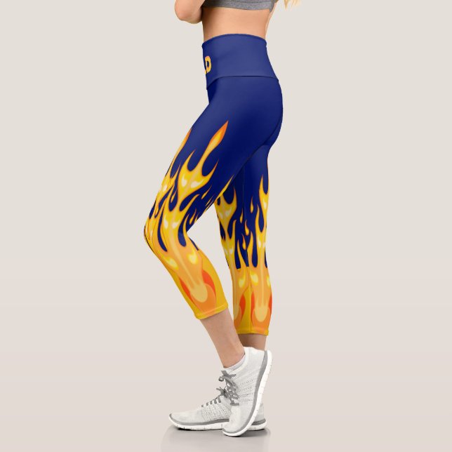 Bold orange yellow fire flames on blue capri leggings (Left)