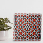 Bold Red Black White Symmetrical Geometric Pattern Tile<br><div class="desc">The design of this ceramic tile is predominantly composed of symmetrical shapes, with diamonds and stars being the most noticeable. Each shape is filled with intricate internal patterns, adding a layer of complexity to the overall design. The colour scheme is bold and striking, with vibrant red elements outlined in black,...</div>