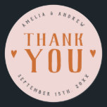 Bold Simple Heart Coral Pink Wedding Favour Classic Round Sticker<br><div class="desc">This bold coral pink wedding favour sticker embraces a retro theme,  featuring vibrant orange text and hearts,  and “thank you” in simple typography. These stickers are perfect for couples wanting to celebrate a retro-inspired,  boho,  fall,  or summer wedding. Explore matching items in our wedding suite to complete the look!</div>