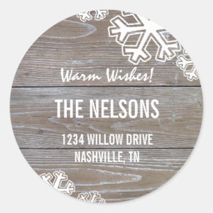 Bold Snowflakes on a wooden Background Classic Round Sticker