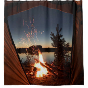 Bonfre near body of water shower curtain
