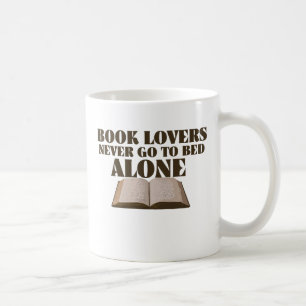 Book lovers never go to bed alone coffee mug