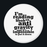 Book on Anti Gravity Funny Science Geek Puns Magnet<br><div class="desc">I'm reading a book on anti gravity and it's impossible to put it down. Funny science pun design for those who love to study science. Cool and humourous quote merchandise for college students majoring in Physics. Perfect for scientist and physicist. Great Christmas gift and birthday present for family and friends....</div>