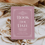 Book Our Date Dusty Rose Vintage Cover Wedding Save The Date<br><div class="desc">These unique wedding save the date cards for book lovers feature a vintage book cover design with a scrolls that frame the wedding date, an ornate "Book Our Date" title, the Bride & Groom names as the authors, a dusty rose pink background / book colour (that can be modified), complete...</div>