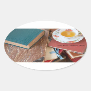 Book stacks with tea oval sticker