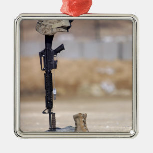 Boots, rifle, dog tags, and protective helmet metal tree decoration