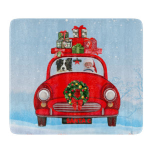 Border Collie Dog In Car With Santa Claus  Cutting Board