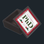 Border Red Holly Name Year PhD Graduation Gift Box<br><div class="desc">A square Phd graduation keepsake magnetic box with a Christmas feel. The top has a decorative border and a holly berry and leaf accents. It has a red, green, and white colour scheme and shows the degree, name, and year. Simply customise this box, add it to your cart, and give...</div>