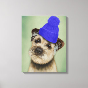 Border Terrier with Blue Bobble Hat Canvas Print