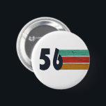 Born in 1956 vintage 70th birthday party 6 cm round badge<br><div class="desc">Add some originality to your wardrobe with this vintage sunset birthday graphic design featuring an awesome typography font. It's a great gift idea for men,  women,  husbands,  wives,  grandmothers,  and grandfathers who will love this unique artwork. The perfect funny holiday present for a happy birthday party.</div>