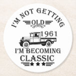 born in 1961 vintage birthday mens gift round paper coaster<br><div class="desc">You can add some originality to your wardrobe collection with this vintage classic truck graphic design with awesome typography font lettering, which is a great gift idea for men, women, husbands, wife grandma, and grandpa who will love this one-of-a-kind artwork. The best amazing and funny holiday present for your happy...</div>