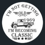 born in 1969 vintage birthday mens gift classic round sticker<br><div class="desc">You can add some originality to your wardrobe collection with this vintage classic truck graphic design with awesome typography font lettering, which is a great gift idea for men, women, husbands, wife grandma, and grandpa who will love this one-of-a-kind artwork. The best amazing and funny holiday present for your happy...</div>