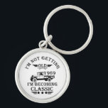 born in 1969 vintage birthday mens gift key ring<br><div class="desc">You can add some originality to your wardrobe collection with this vintage classic truck graphic design with awesome typography font lettering, which is a great gift idea for men, women, husbands, wife grandma, and grandpa who will love this one-of-a-kind artwork. The best amazing and funny holiday present for your happy...</div>