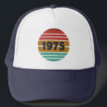 Born in 1975 vintage 50th birthday gift trucker hat<br><div class="desc">This vintage classic graphic design with awesome typography font lettering can add originality to your wardrobe collection. It is a great gift idea for men, women, husbands, wives, girlfriends, and boyfriends who will love this one-of-a-kind artwork. It is the best and most funny holiday present for your happy birthday party....</div>