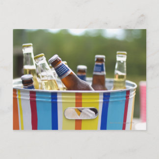 Bottles of beer in ice bucket postcard