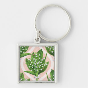 Bouquet of lilly of the valley flowers on green key ring