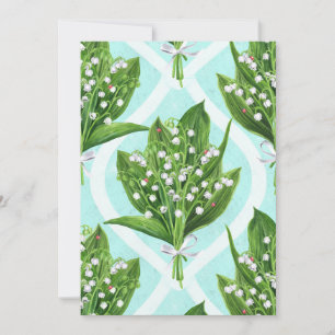 Bouquet of lily of the valley flowers on blue