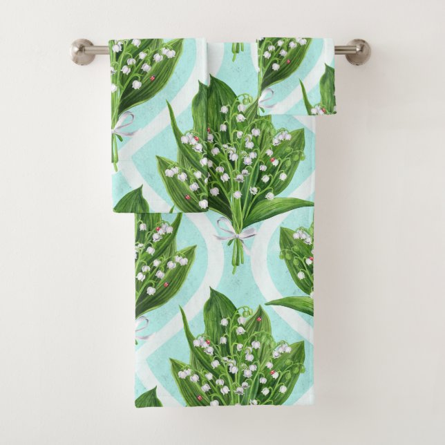 Bouquet of lily of the valley flowers on blue bath towel set (Insitu)
