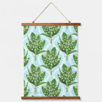 Bouquet of lily of the valley flowers on blue
