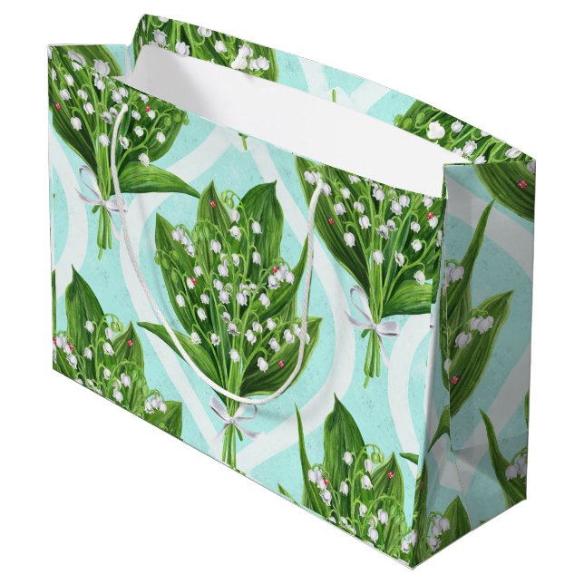 Bouquet of lily of the valley flowers on blue large gift bag (Back Angled)