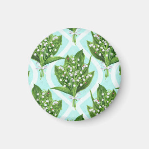 Bouquet of lily of the valley flowers on blue magnet