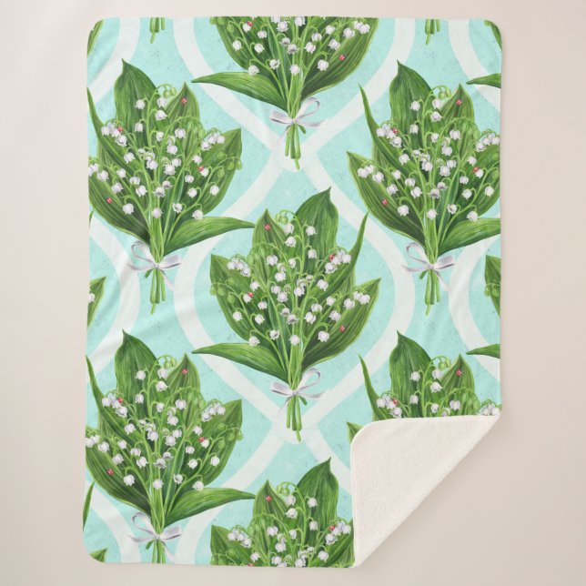 Bouquet of lily of the valley flowers on blue sherpa blanket (Front)