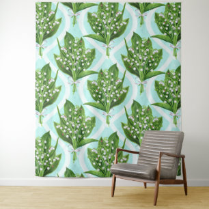 Bouquet of lily of the valley flowers on blue tapestry